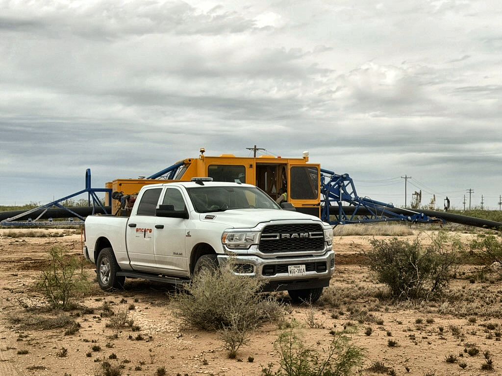 Encore crew truck at a fast fusion machine joining HDPE pipeline on a Permian lease